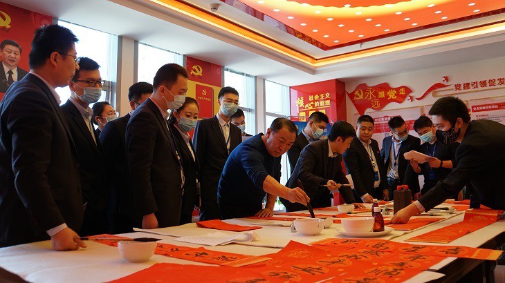 担保集团举办“翰墨飘香 迎春送福”活动